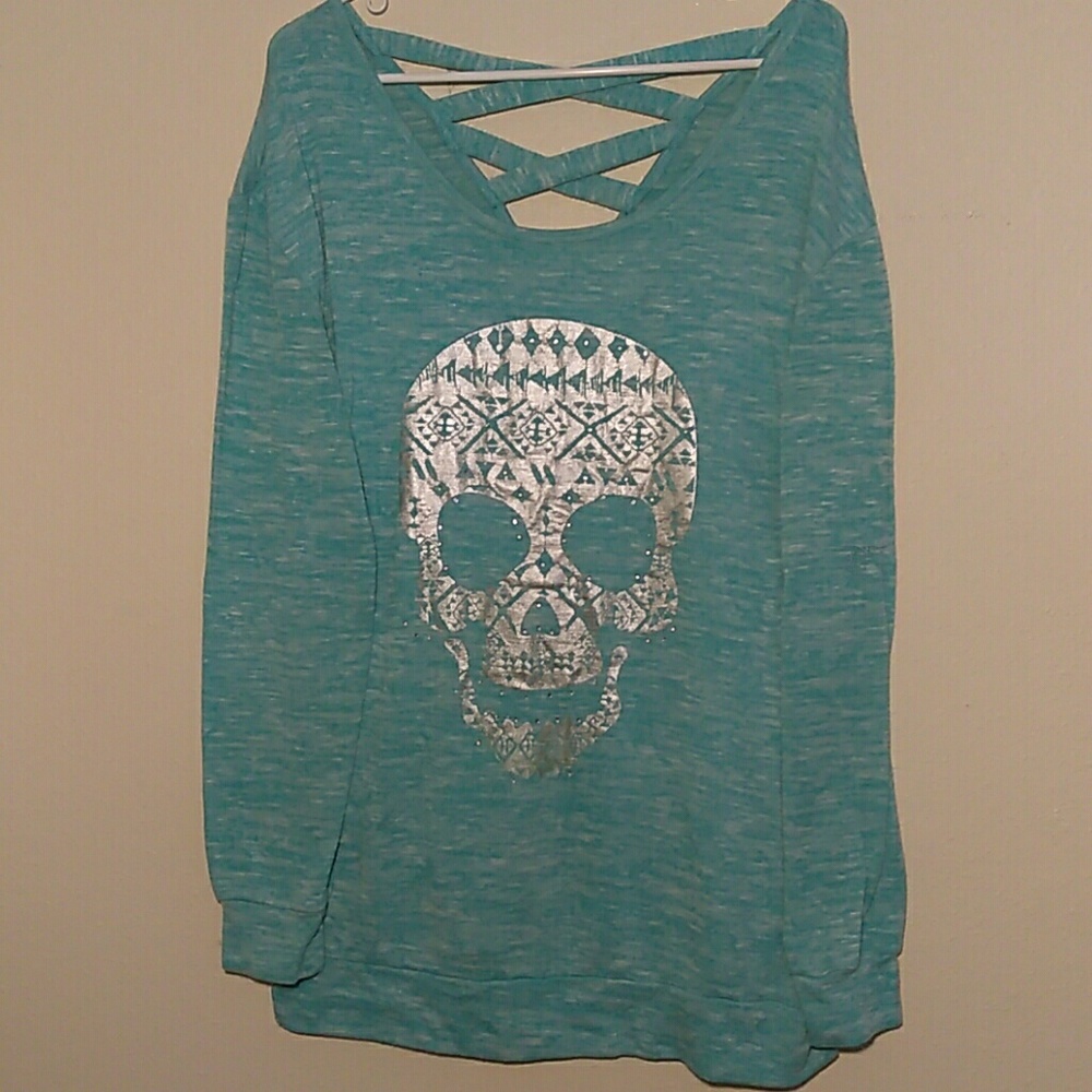 Long sleeve blue top with skull